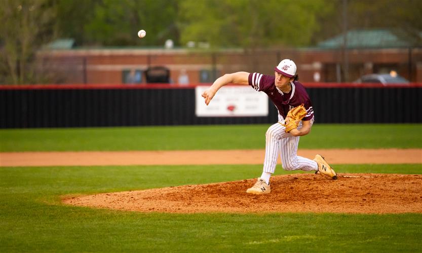 The Franklin High varsity pitcher throws the ball.